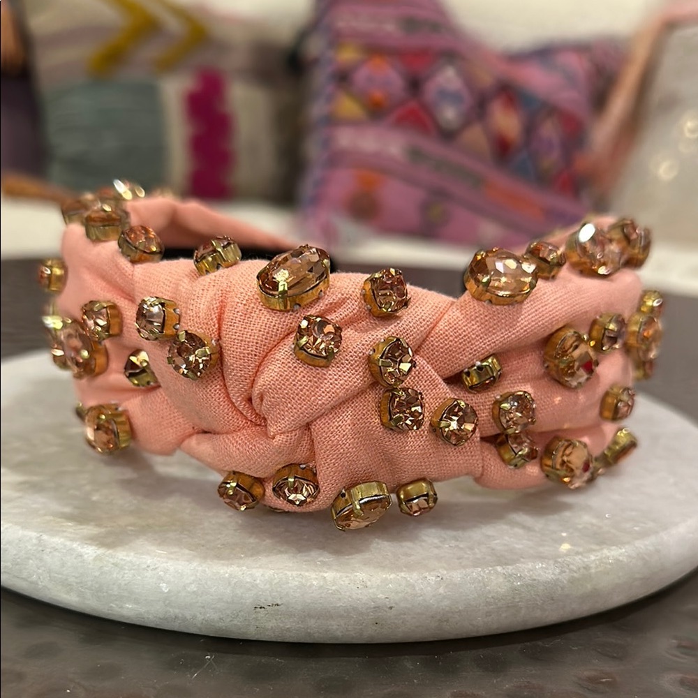 Oval Crystal Knotted Headband in the color  Peach Fuzz